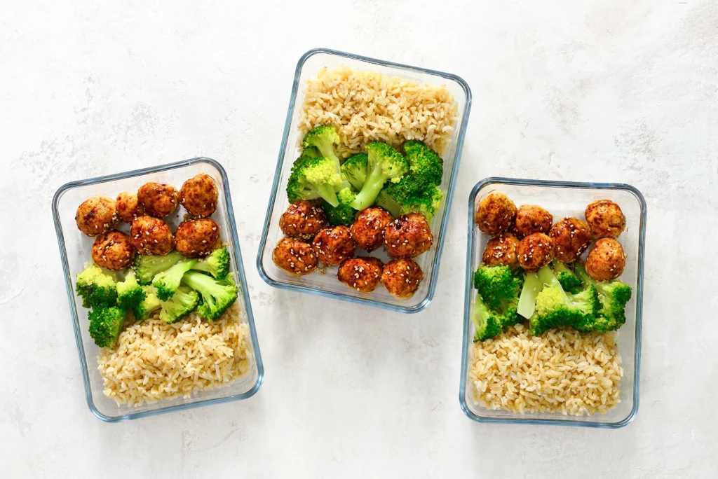 Healthy weekly meal prep containers prepared by a Denver personal chef service.