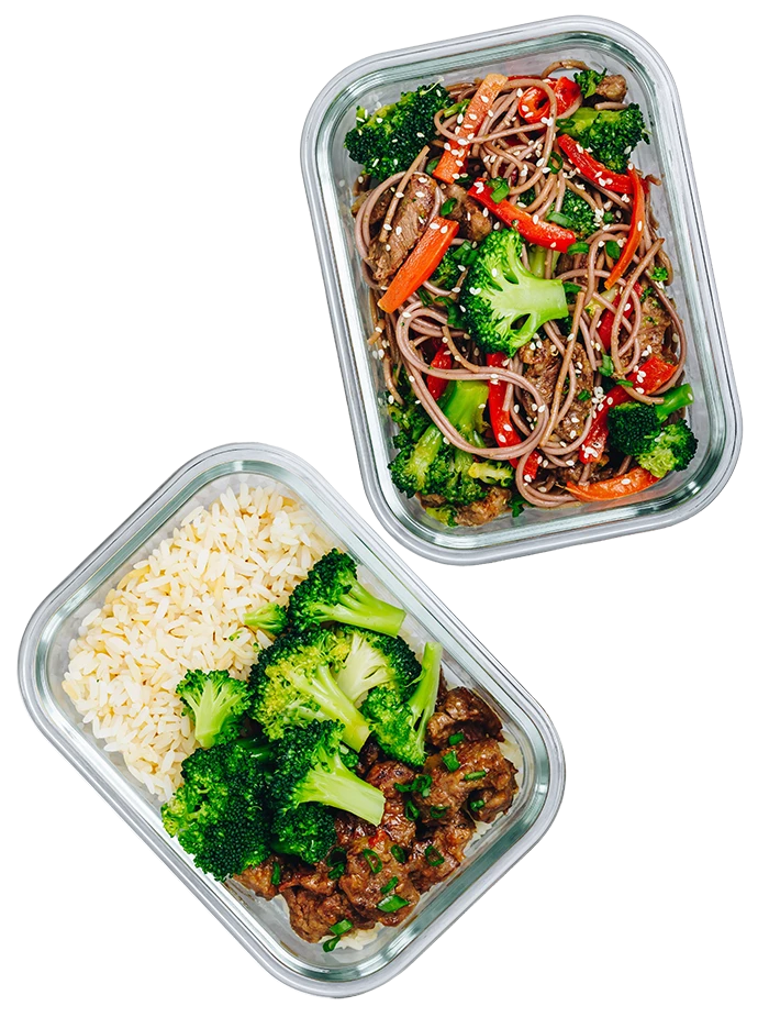 Healthy prepared meals from a Denver meal prep service featuring fresh vegetables, rice, and noodle dishes.