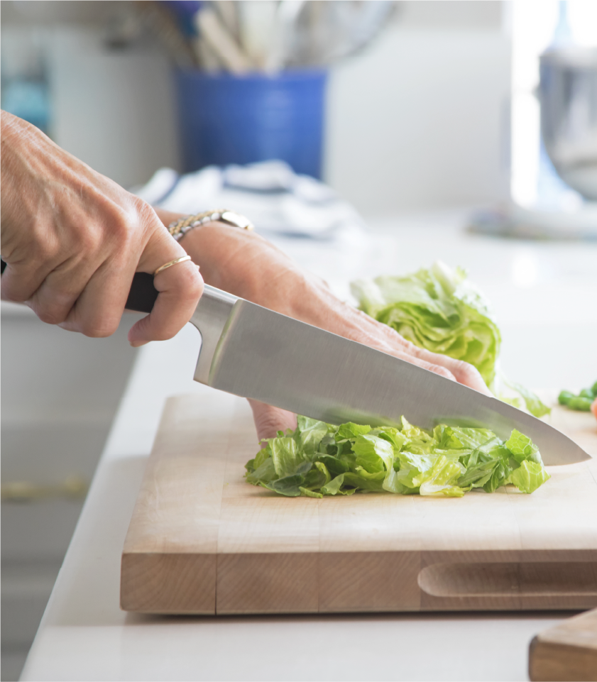 Fresh vegetables being prepared for healthy customized meal prep services.
