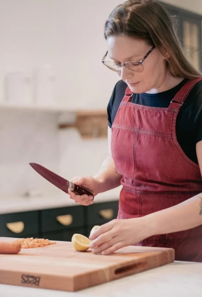 Personal chef in Denver preparing fresh ingredients for customized in-home meal services.